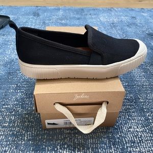 New in box! Zodiac “Ciara” black slip ons size 8